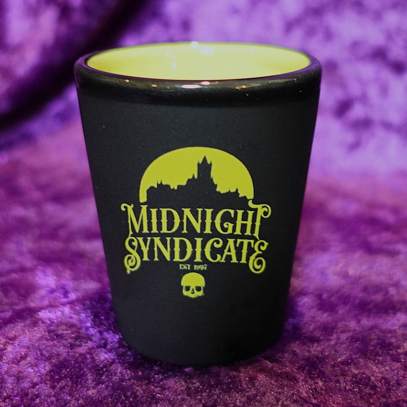 Midnight Syndicate green shot glass (alternate logo)